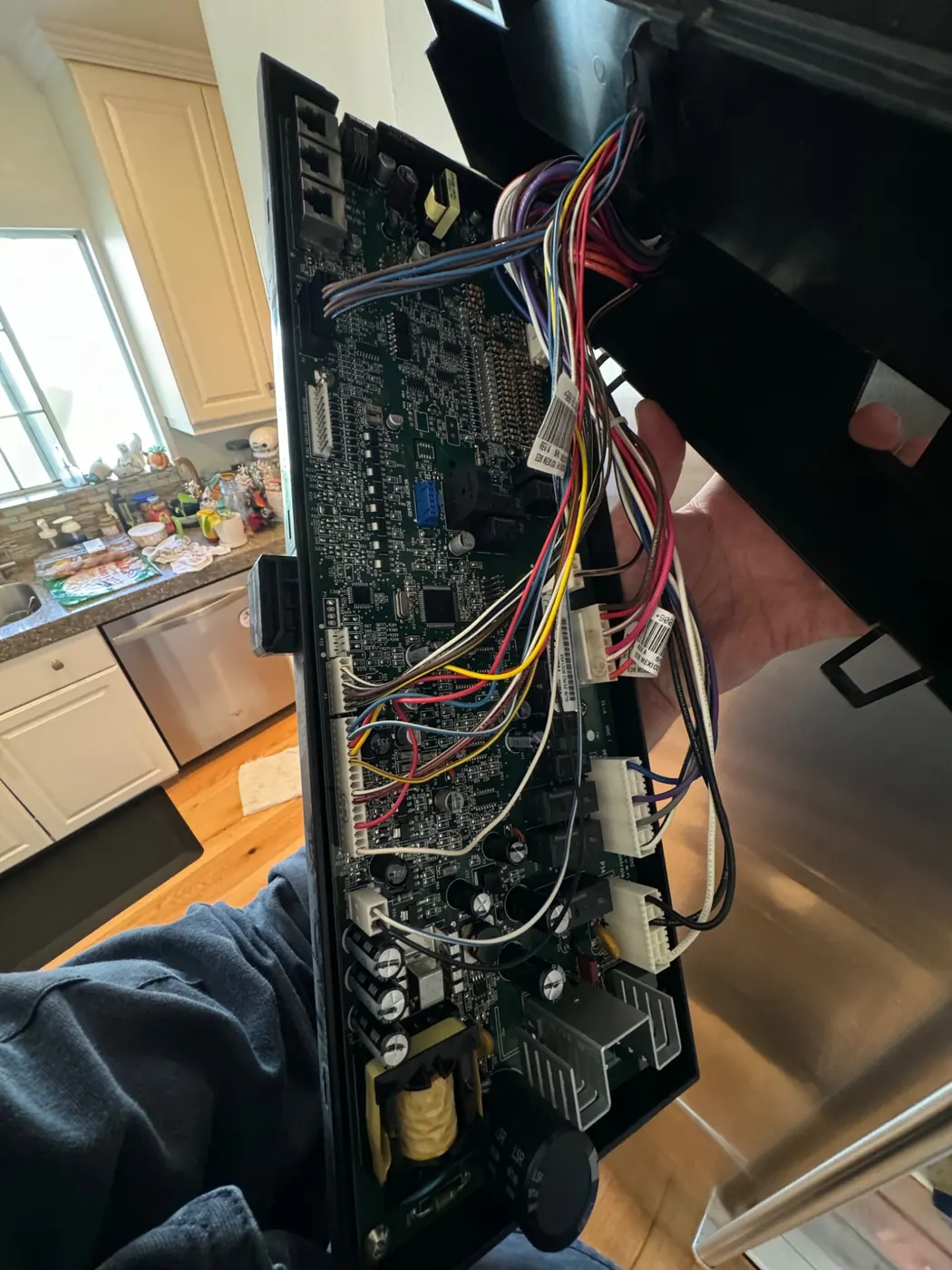 Dense wiring harness on a removed appliance control board
